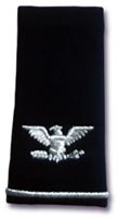 A COLONELL'S SHOULDER MARKINSIGNIA FOR WEAR ON THE SERVICE DRESS UNIFORM SHIRT